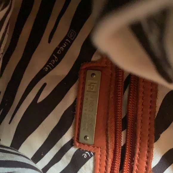 Linea Pelle Cross body added dressed coin purse. - Picture 8 of 11